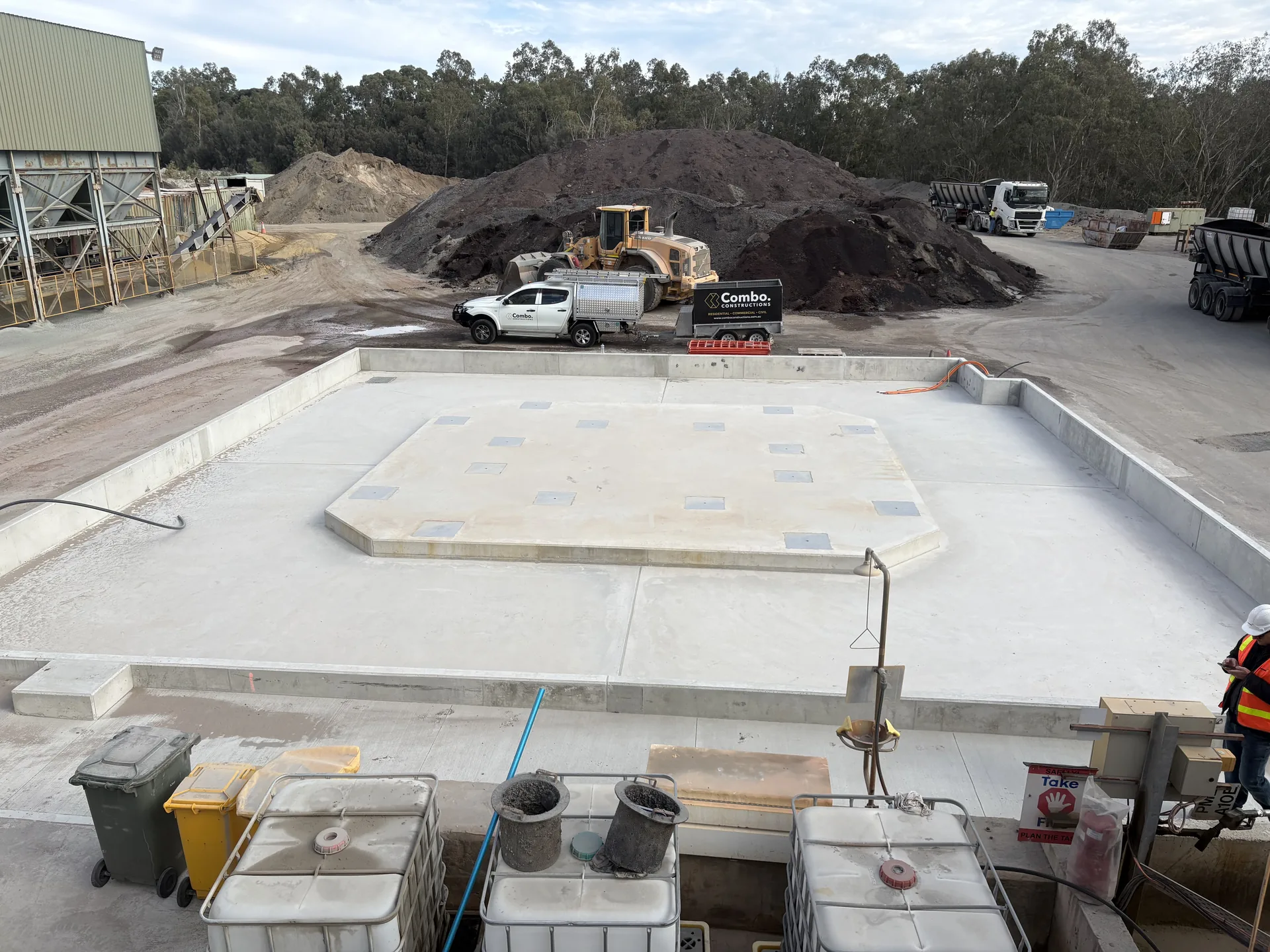 Concrete hardstand pour in progress at the Downer civil plant site